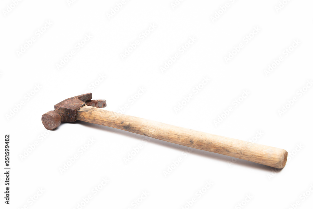 old rusty and dirty wooden handle hammer isolated on white background. old rusty and dirty wooden handle hammer isolated on white background.