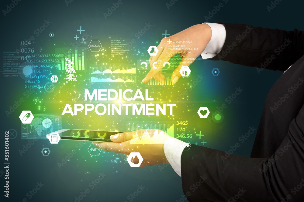 Close-up of a touchscreen with MEDICAL APPOINTMENT inscription, medical concept Close-up of a touchscreen with MEDICAL APPOINTMENT inscription, medical concept