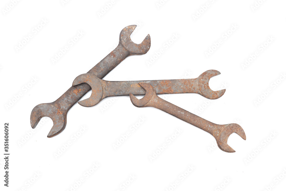 Old rusty wrench isolated on white background. Old rusty wrench isolated on white background.