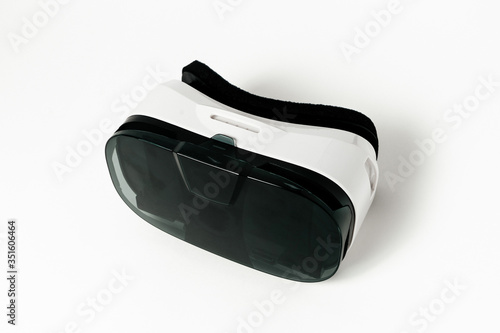 Original black stereoscopic 3d vr mask with headphones, with controller. Isolated on white background.