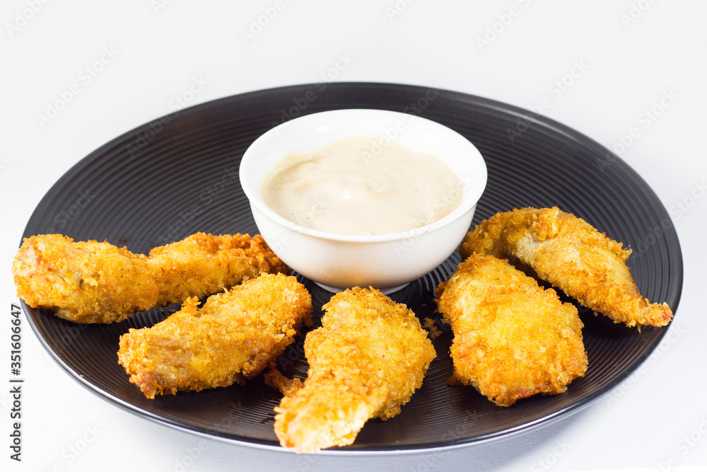 Chicken nuggets on the table, studio shot and white background Chicken nuggets on the table, studio shot and white background