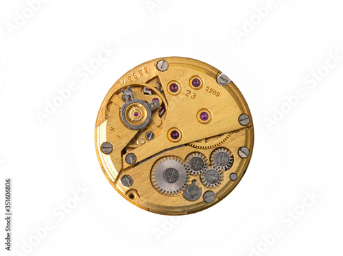 Vintage wristwatch mechanism isolated on a white background.