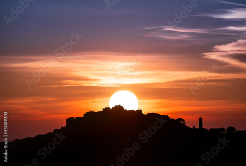 Sunset over village of Sant Antonino in Corsica