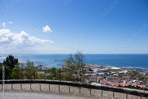 The view from the top of the Santa Luzia hill. Aerial view of Estaleiros Navais de Viana do Castelo (ENVC shipyard), Limia River and the Atlantic Ocean in Northern Portugal.