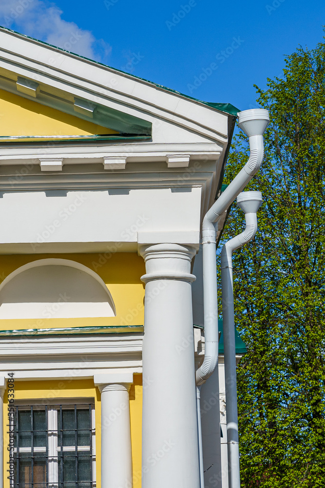 fragment of the facade of a historic building, a merchant's mansion in a Russian city