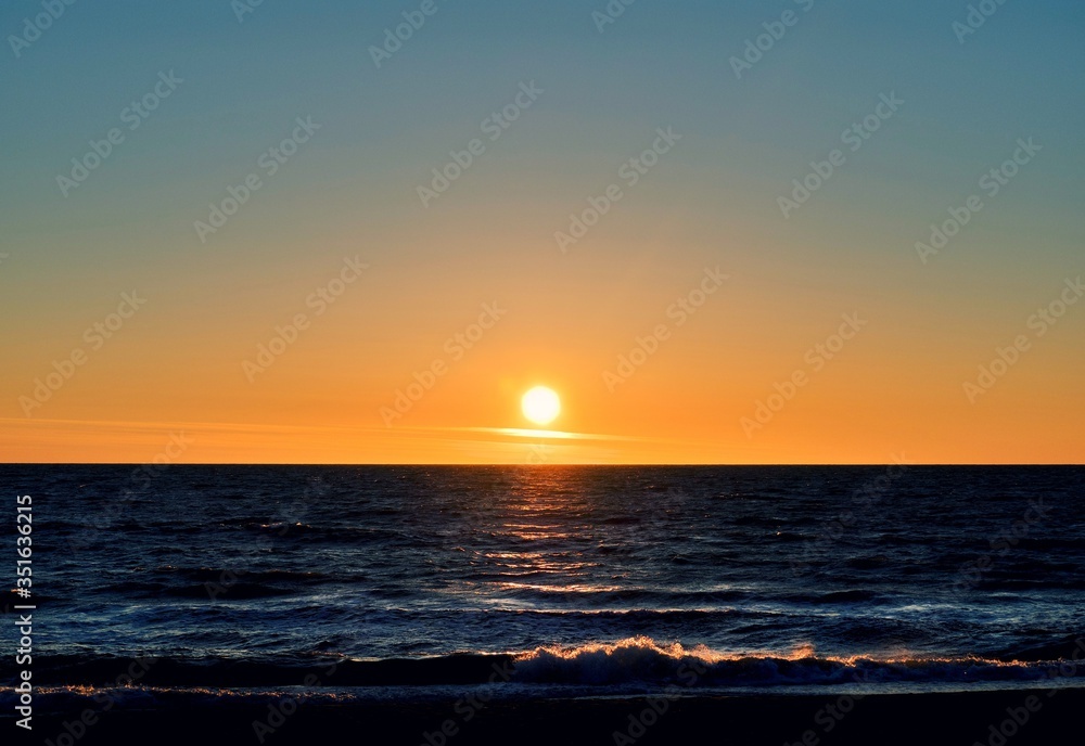 Sun and sea orange sunset background. Nature composition.