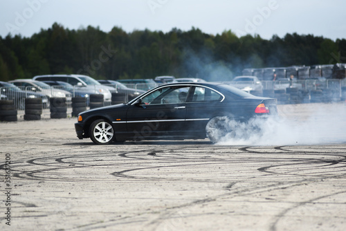 Sport car during drifting. Sport car during drifting.