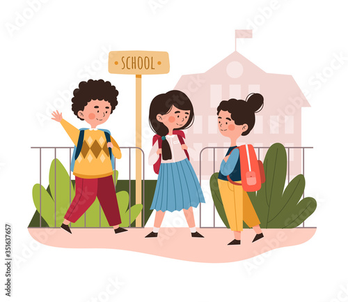Group of young school children meeting under a School sign in front of the building wearing their backpacks, colored vector illustration
