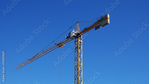 Tractors and excavators work on the construction of the foundation zero cycle