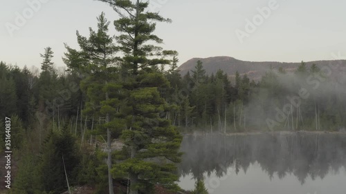 Early morning mist on Onawa Lake, Maine Piscataquis County  photo