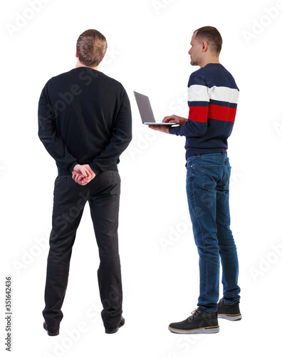 Back view two man in sweater with laptop.