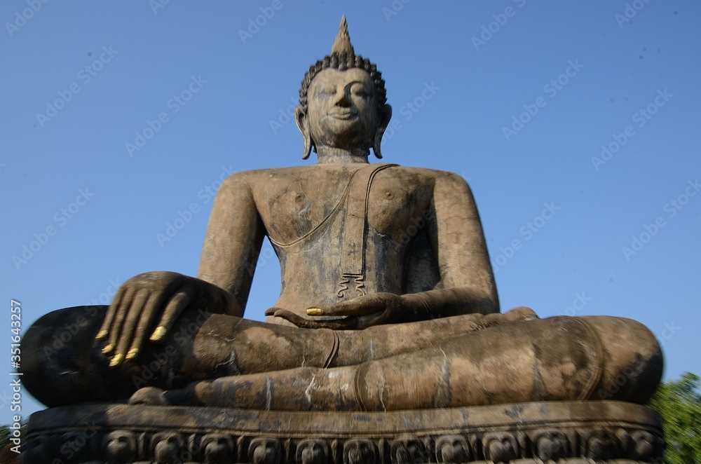 Sitting Buddha at Wat Mahathat in the Historical Park of Sukhothai Sitting Buddha at Wat Mahathat in the Historical Park of Sukhothai