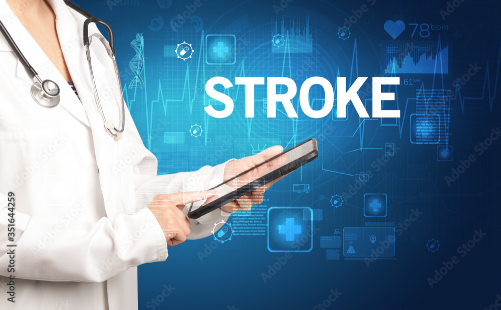 young doctor writing down notes with STROKE inscription, healthcare concept young doctor writing down notes with STROKE inscription, healthcare concept