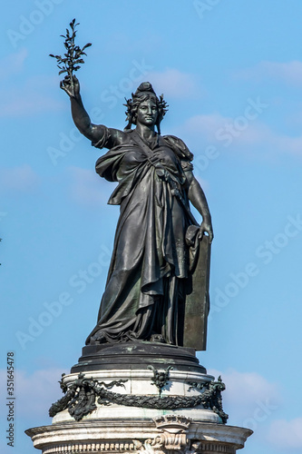 Paris, France - May 14, 2020: Marianne bronze statue, national symbol of the French Republic at Place de la Republique in Paris photo