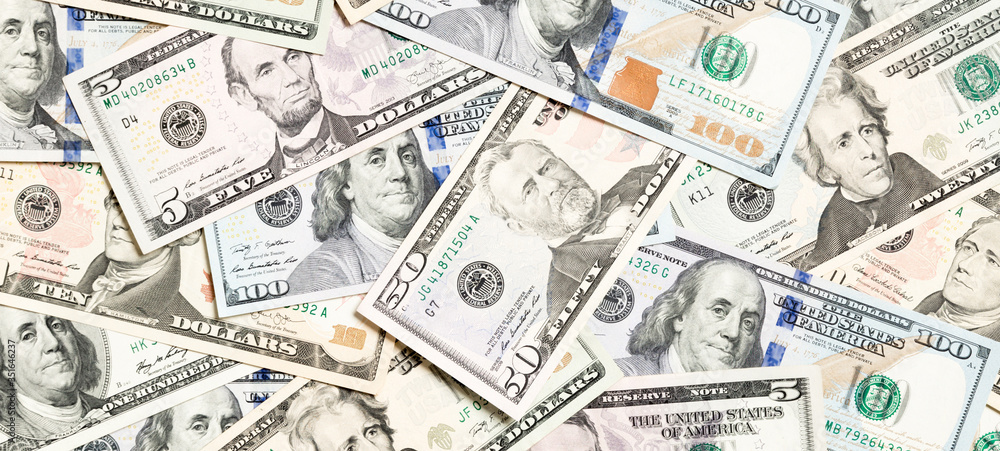 Top view of various dollar cash background. Different banknotes concept. Wealth and rich concept Top view of various dollar cash background. Different banknotes concept. Wealth and rich concept