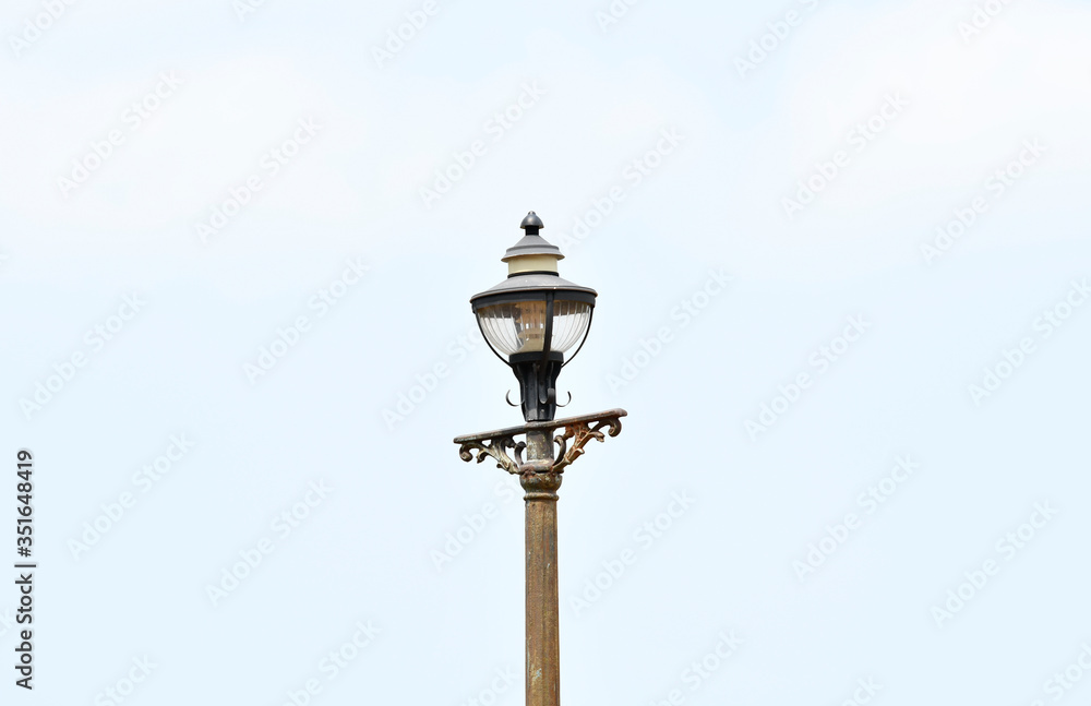 vintage lamp on white sky background 