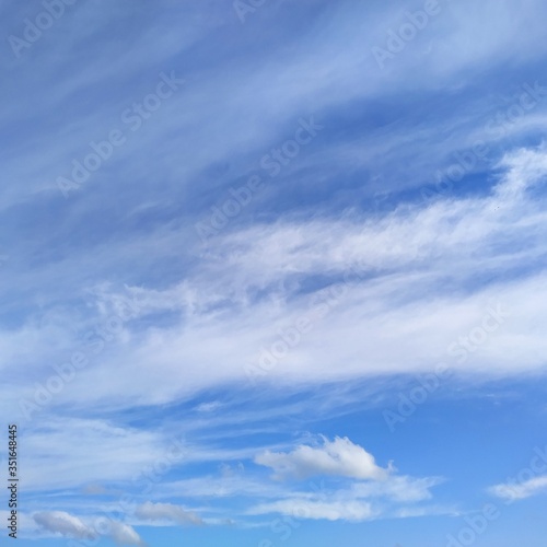 Fototapeta Naklejka Na Ścianę i Meble -  gentle blue sky with clouds, square shape background