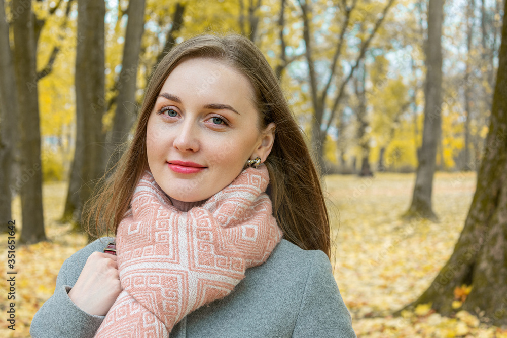 Beautiful woman walking in autumn Park, portrait, close up Beautiful woman walking in autumn Park, portrait, close up