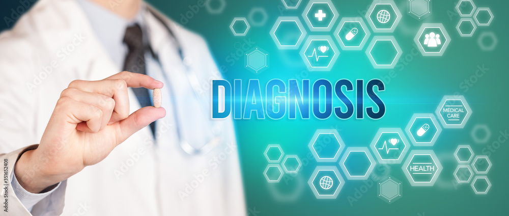 Close-up of a doctor giving you a pill with DIAGNOSIS inscription, medical concept Close-up of a doctor giving you a pill with DIAGNOSIS inscription, medical concept