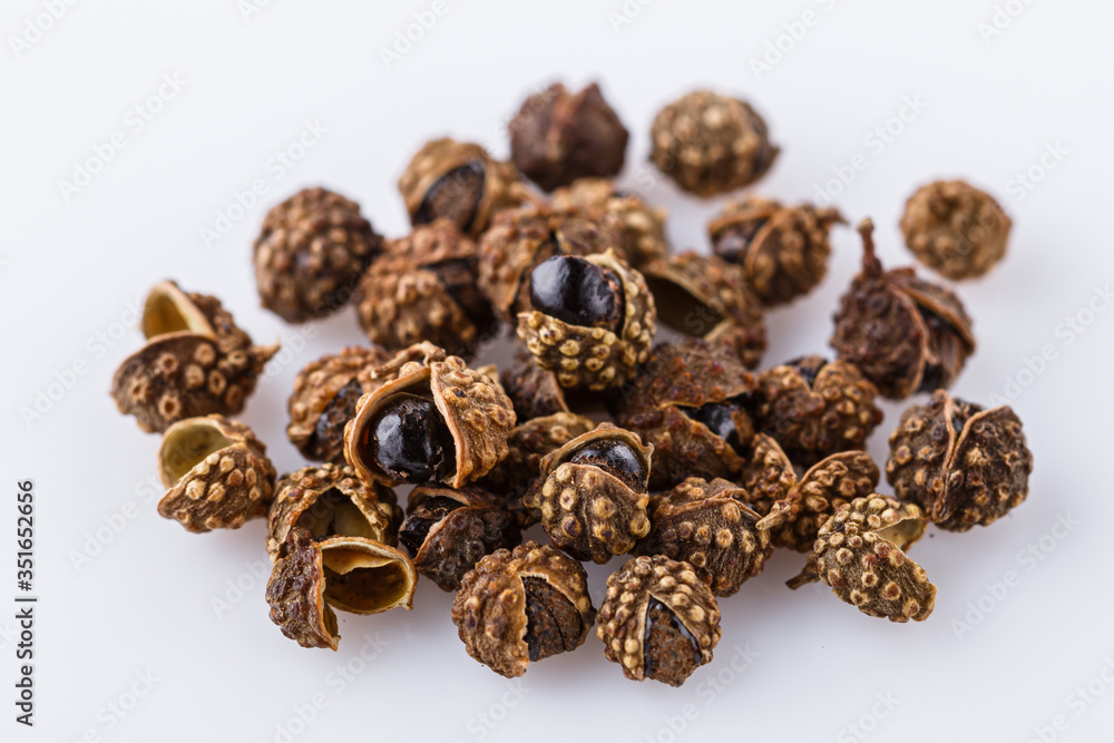 fragrant Sichuan pepper on white acrylic background fragrant Sichuan pepper on white acrylic background