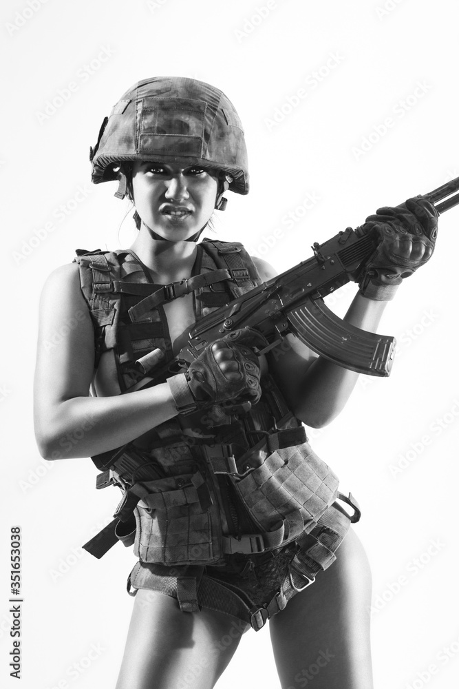 Beautiful girl in military clothes. studio shot Beautiful girl in military clothes. studio shot