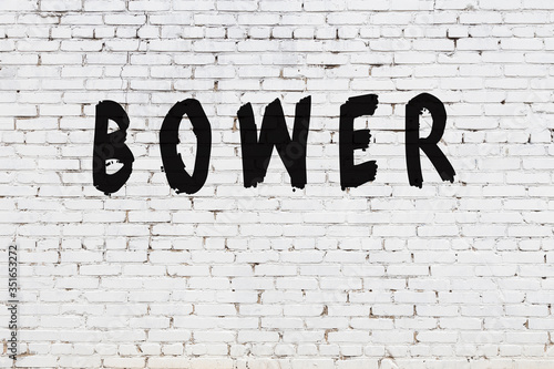 Fotobehang Word bower painted on white brick wall