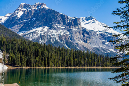 Last vestages of winter hang onto Emerald Lake. Yoho National Park. British Columbia  Canada.