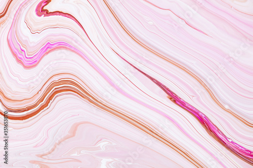 Fluid art texture. Background with abstract swirling paint effect. Liquid acrylic picture with flows and splashes. Mixed paints for website background. Pink, white and brown overflowing colors