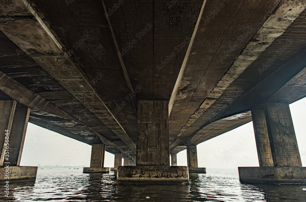 Underneath the Third Mainland Bridge which is one of the longest bridges in Africa Underneath the Third Mainland Bridge which is one of the longest bridges in Africa
