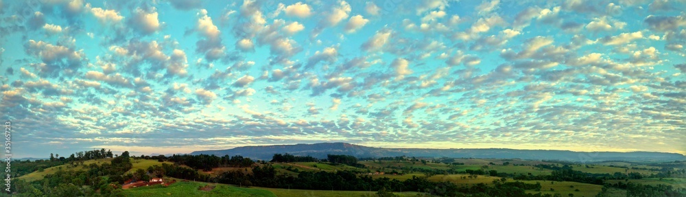 Aerial view of dramatic sky in the ranch. Rural life scene. Countryside landscape. Aerial view of dramatic sky in the ranch. Rural life scene. Countryside landscape.