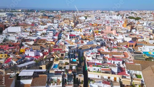The aerial view on historical residential neighborhood of Seville with Puente del Alamillo on the background, Spain photo