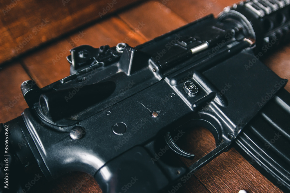 Obraz premium battered assault rifle airsoft game is on the table