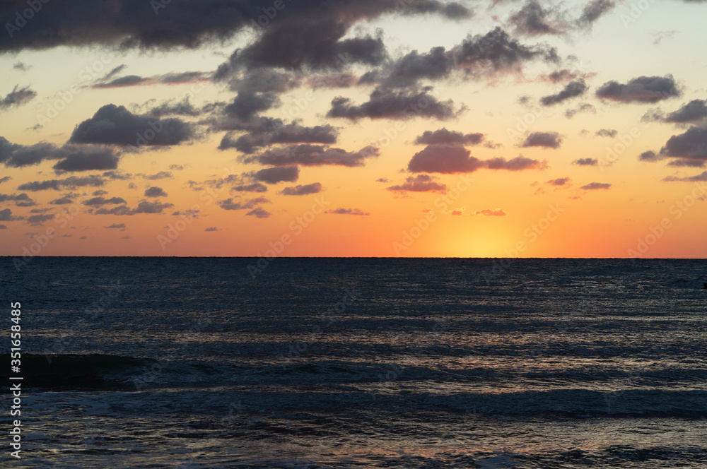 Sunrise on sea shore