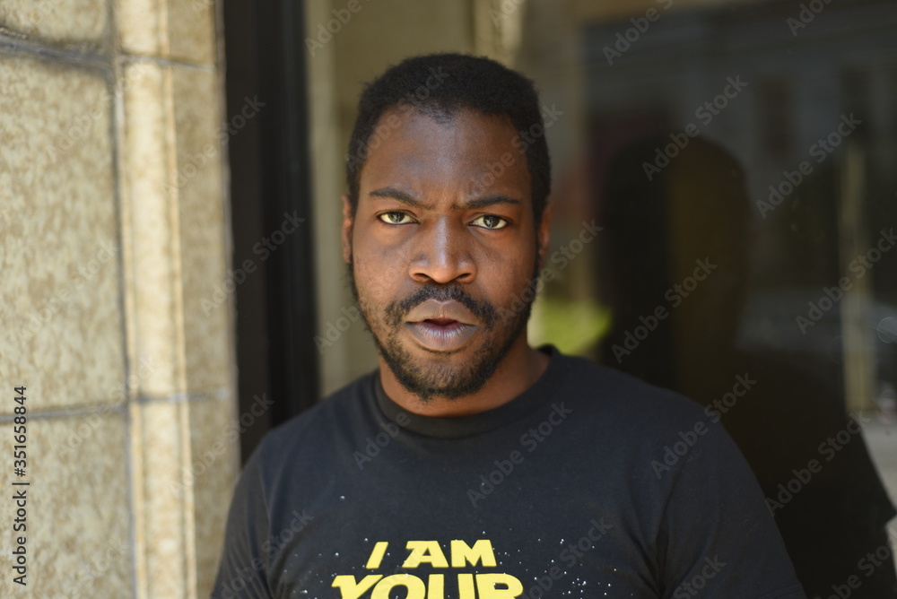 Obraz premium Portrait of cool american man outside. American handsome man picture. Man emotions.