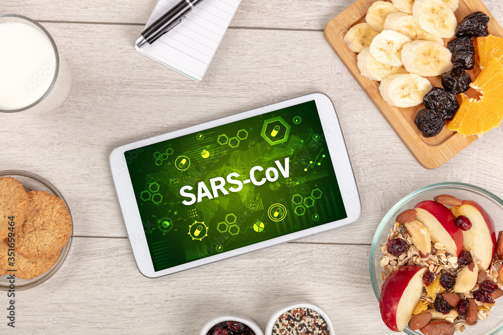 Healthy Tablet Pc compostion with SARS-CoV inscription, immune system boost concept Healthy Tablet Pc compostion with SARS-CoV inscription, immune system boost concept
