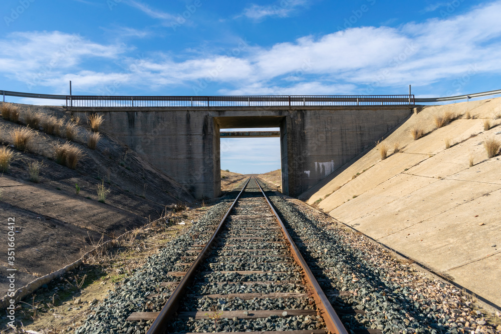 Train track passing through a door Train track passing through a door