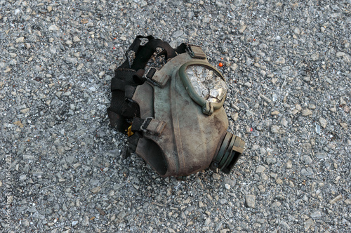 Wallpaper Mural Old gas mask in Chernobyl lies on the asphalt Torontodigital.ca