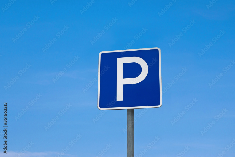 International traffic sign 'Parking' on clear blue sky background