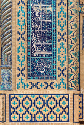Close-up of mosaic wall with Islamic calligraphy at Ulugbek Medressa, Bukhara, Uzbekistan