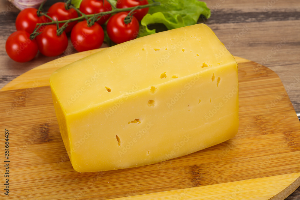 Hard yellow tasty cheese brick Hard yellow tasty cheese brick