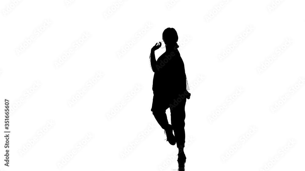 black silhouette on a white background, young beautiful woman dancer dancing hip hop, contemporary, modern street dance, slow motion black silhouette on a white background, young beautiful woman dancer dancing hip hop, contemporary, modern street dance, slow motion