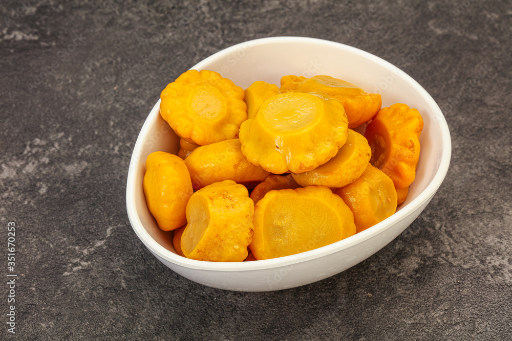 Marinated yellow patisson in the bowl Marinated yellow patisson in the bowl
