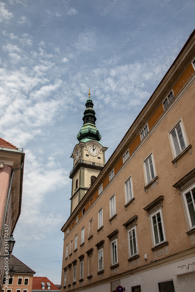 View of a historic church in Klagenfurt, Austria with blue sky,Europe View of a historic church in Klagenfurt, Austria with blue sky,Europe