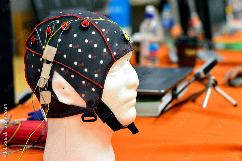 Fotka „The electroencephalogram (EEG) head cap with flat metal discs ...
