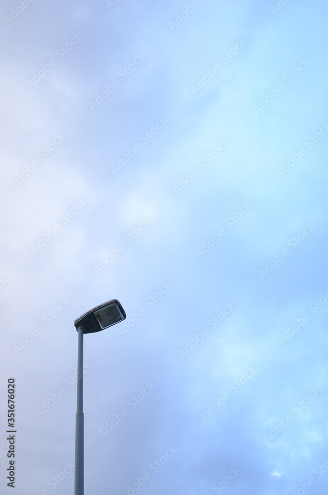 Black lantern lamp post with blurry background Black lantern lamp post with blurry background