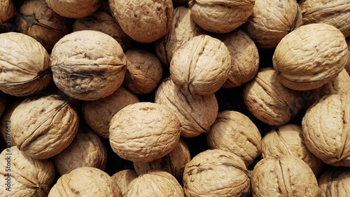 whole walnuts as background