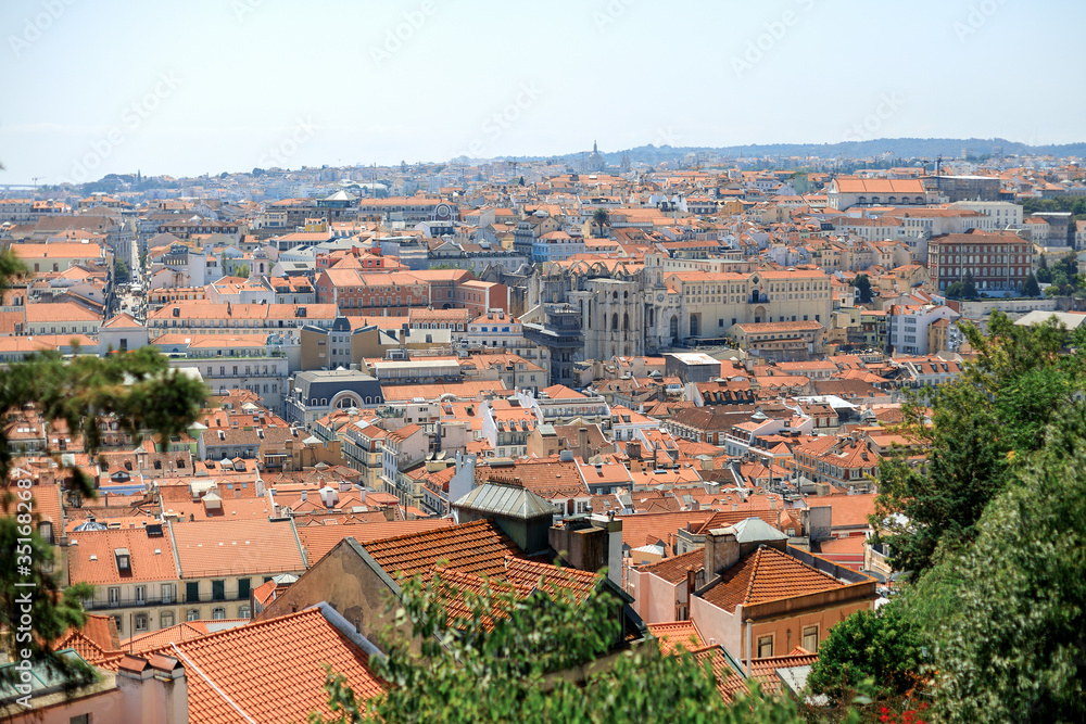 Buildings with orange roofs. Summer in Lisbon. Portugal
