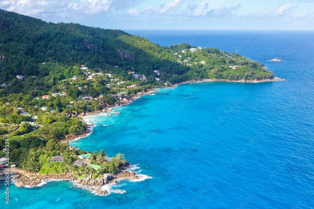 Seychelles landscape luxury villa beach Mahe vacation ocean aerial photo view