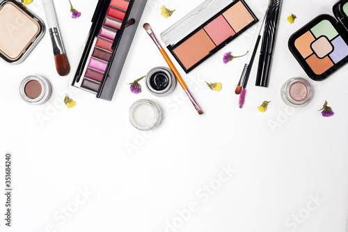 Woman make up products and accessories on white background.professional decorative cosmetics, makeup tools
