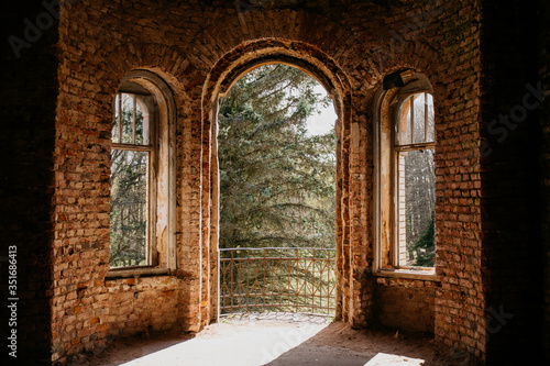 old brick destroyed building. Ruined walls and windows